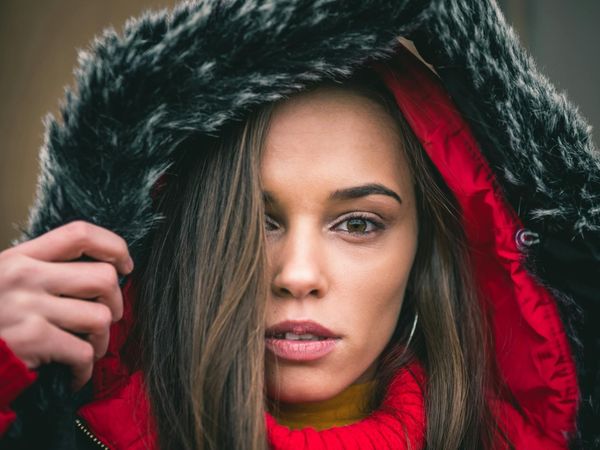 Close up of a person looking into the distance calmly