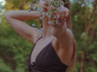 Soft blurred background of a summer park in sunlight